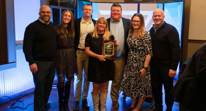 The Steinhauser team accepts a 2024 Printer of the Year Award from Graphic Media Alliance (GMA).